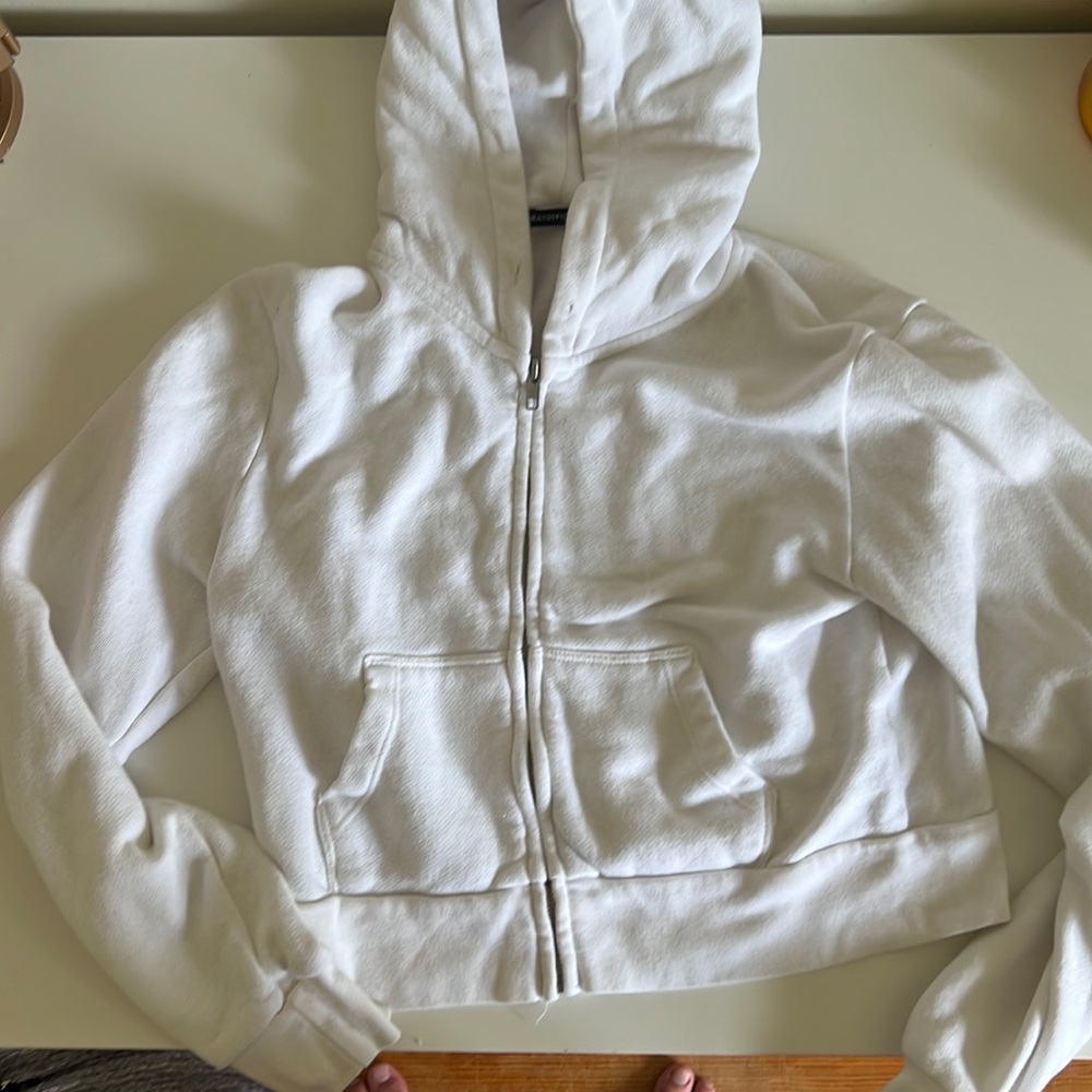 Brandy Melville zip-up cropped jacket.